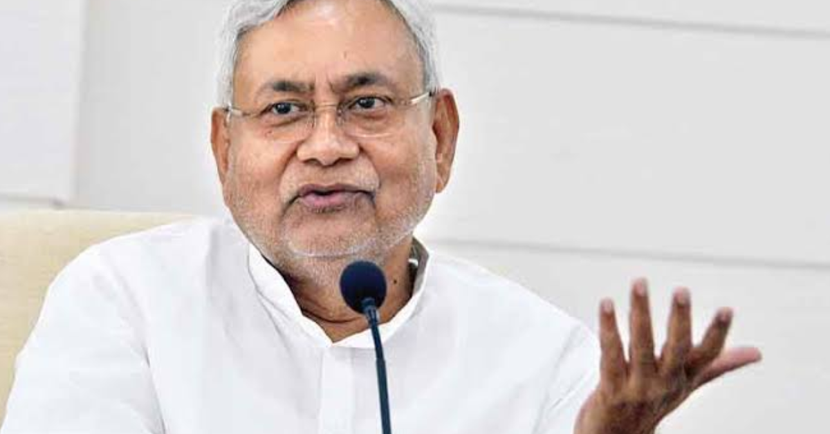 Nitish Kumar, Chief Minister of Bihar, speaking at a political event, reaffirming his support for Prime Minister Narendra Modi and the BJP-led National Democratic Alliance (NDA), amidst speculation about a potential reunion with the INDIA opposition bloc.