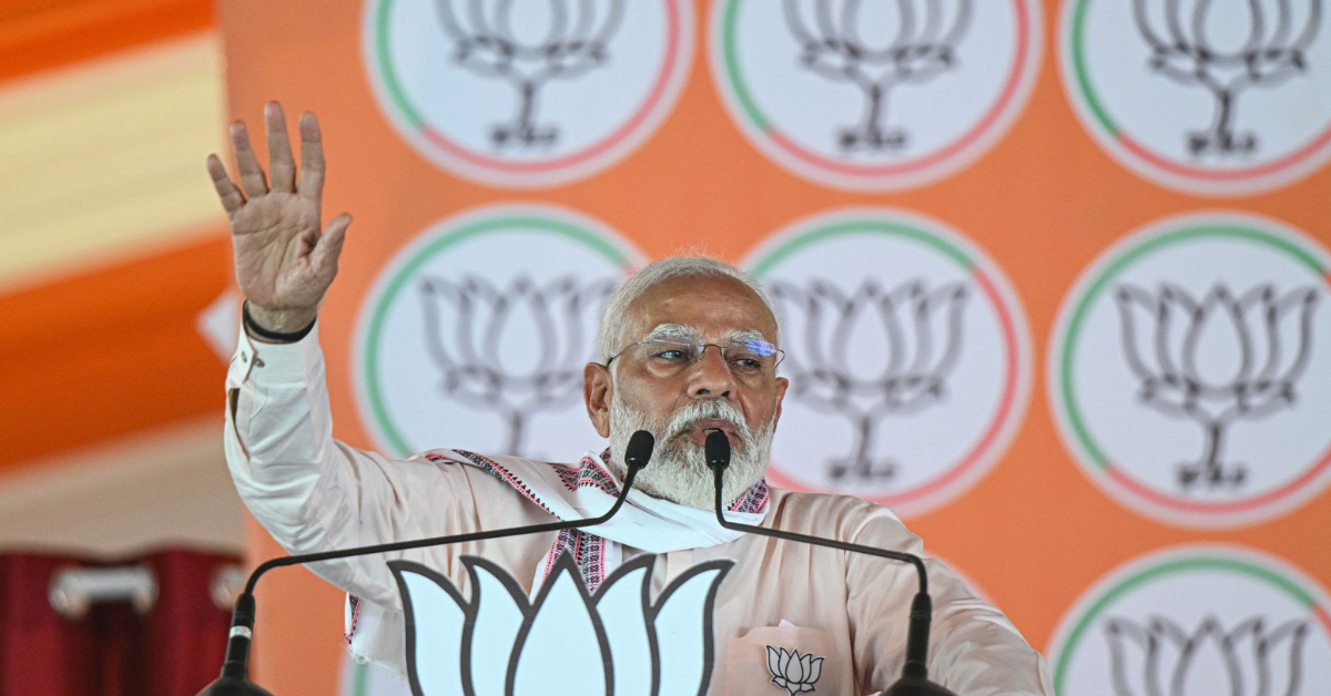 Prime Minister Narendra Modi delivering a speech, emphasizing the strength of the NDA coalition and mocking the Congress party's electoral performance.